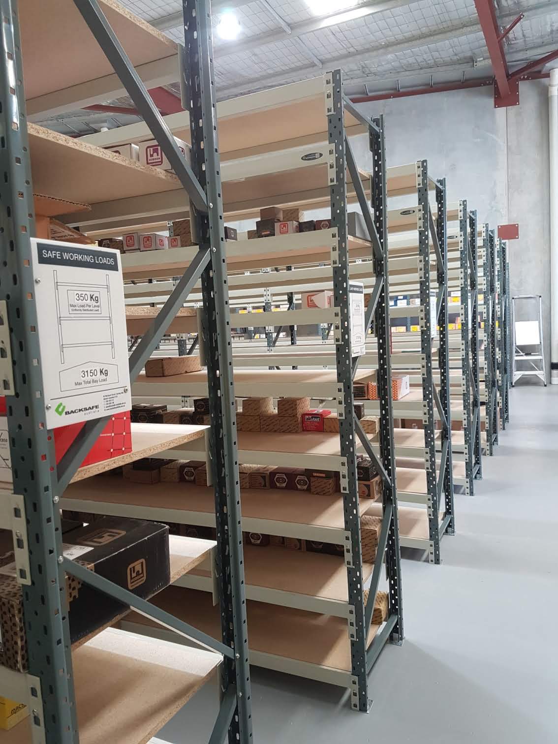 Backsafe’s longspan shelving system in place at Searle Fasteners—efficient, clearly labelled, and built to handle up to 350kg per level for optimal warehouse performance.