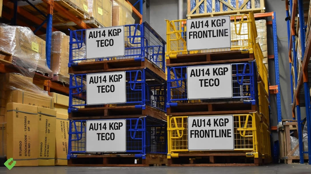 Stacked and ready—custom colour-coded WERKS® Pallet Cages built for AU14 KGP operations, streamlining storage and site identification at Woodside Energy.