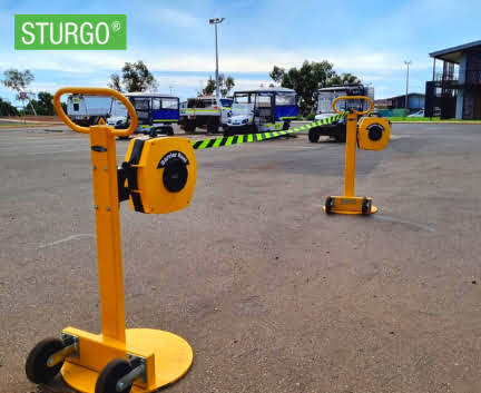 The Lemur: Mobile Barrier Stand for Retractable Tape Reels