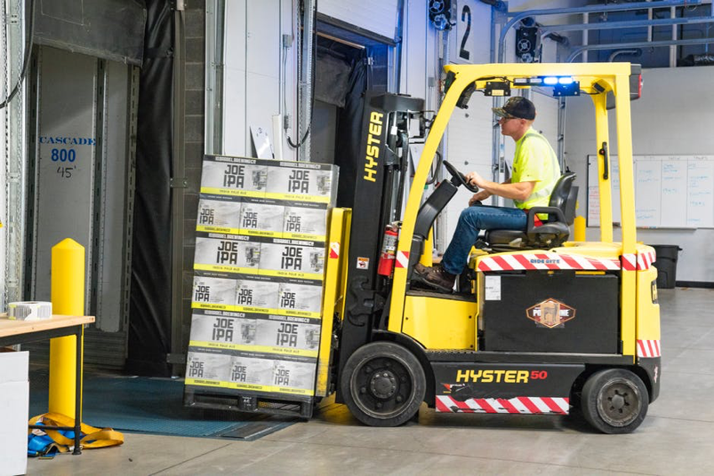 worker-using-forklift.png