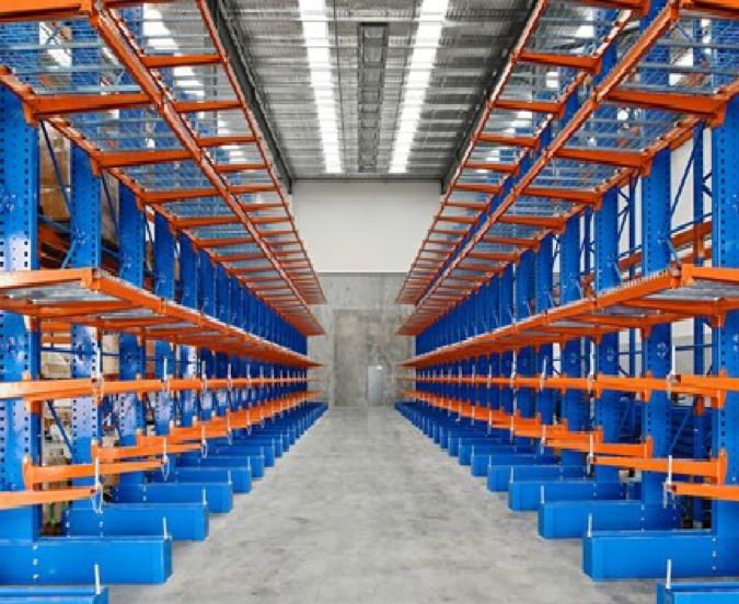 warehouse.png Rows of orange and blue warehouse shelving